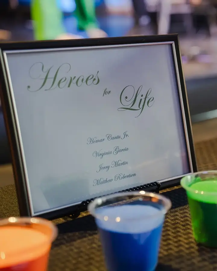 Paint-in-plastic-cups-in-front-of-candles