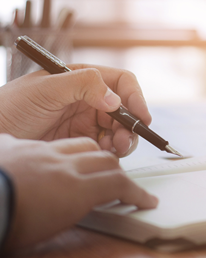 taking-notes-in-a-meeting-patient-advocate