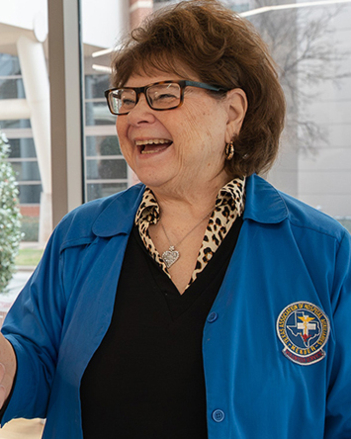 Woman-handing-popcorn-to-customer