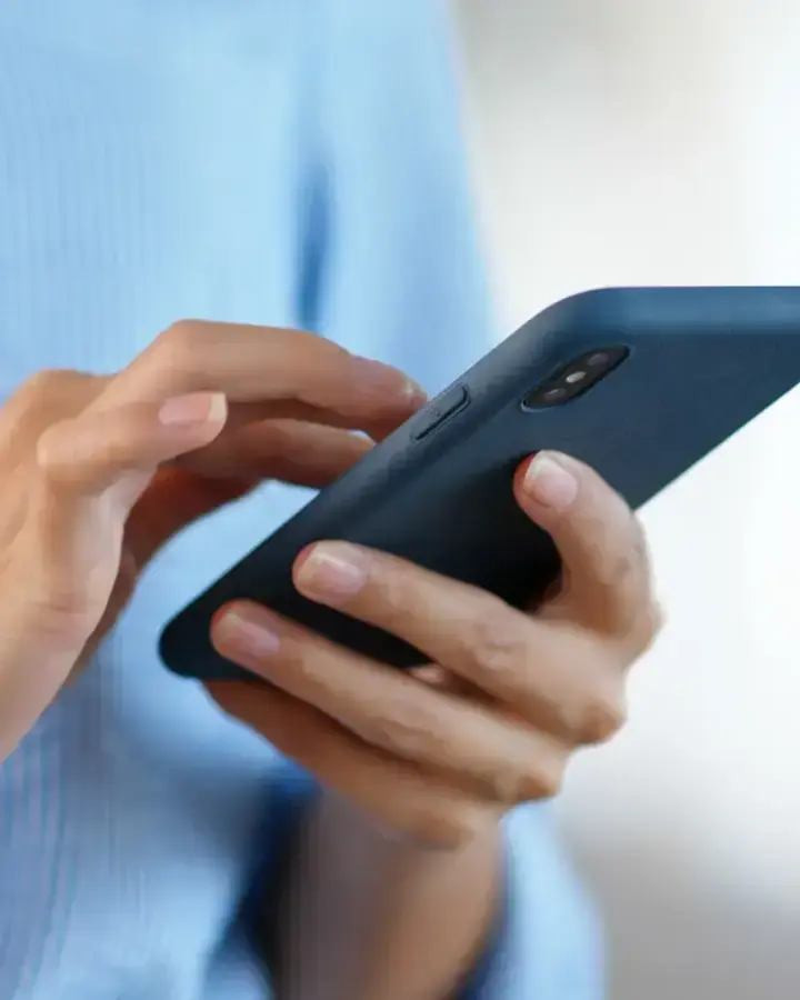 a woman using her phone 