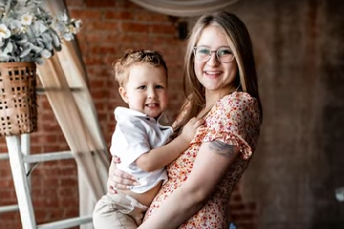 you-woman-smiling-with-child