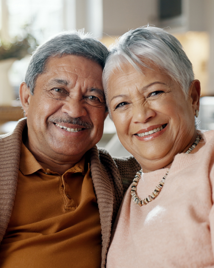an-older-man-with-his-arm-around-an-older-woman