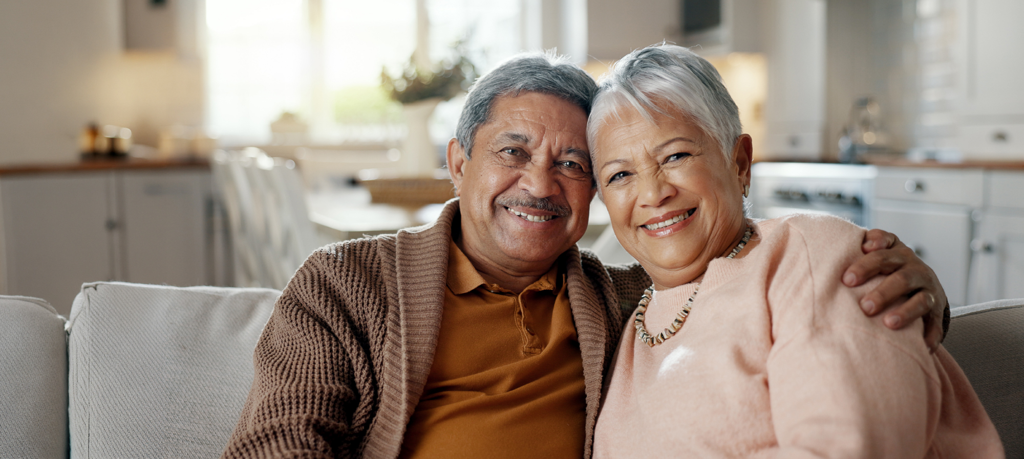 an-older-man-with-his-arm-around-an-older-woman